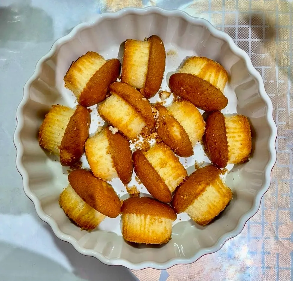 Step 1: Cut the cupcakes or butter cake into halves and arrange them in a serving dish. If there a
