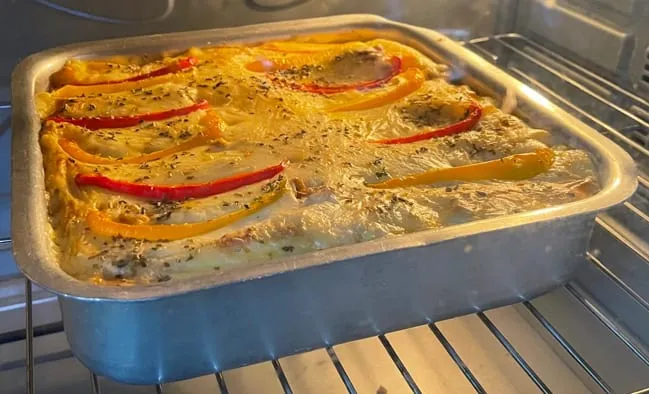 Step 10, photo 1: Bake at 180°C according to the instructions on your lasagna sheets package, or until the t